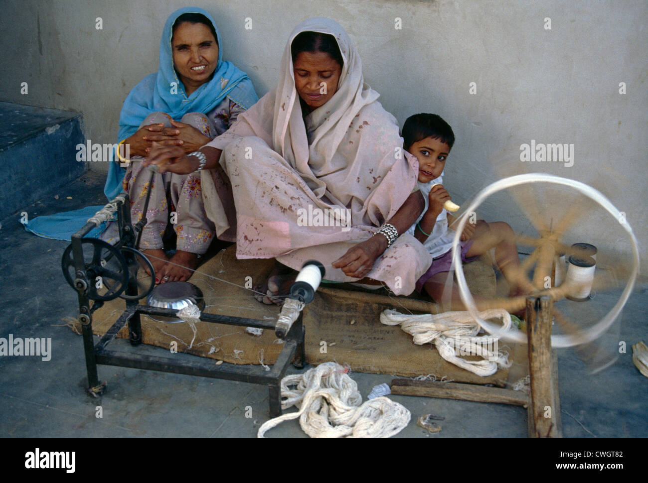 Jaipur India Leper Community Woman Spinning Cotton For Weaving Stock Photo