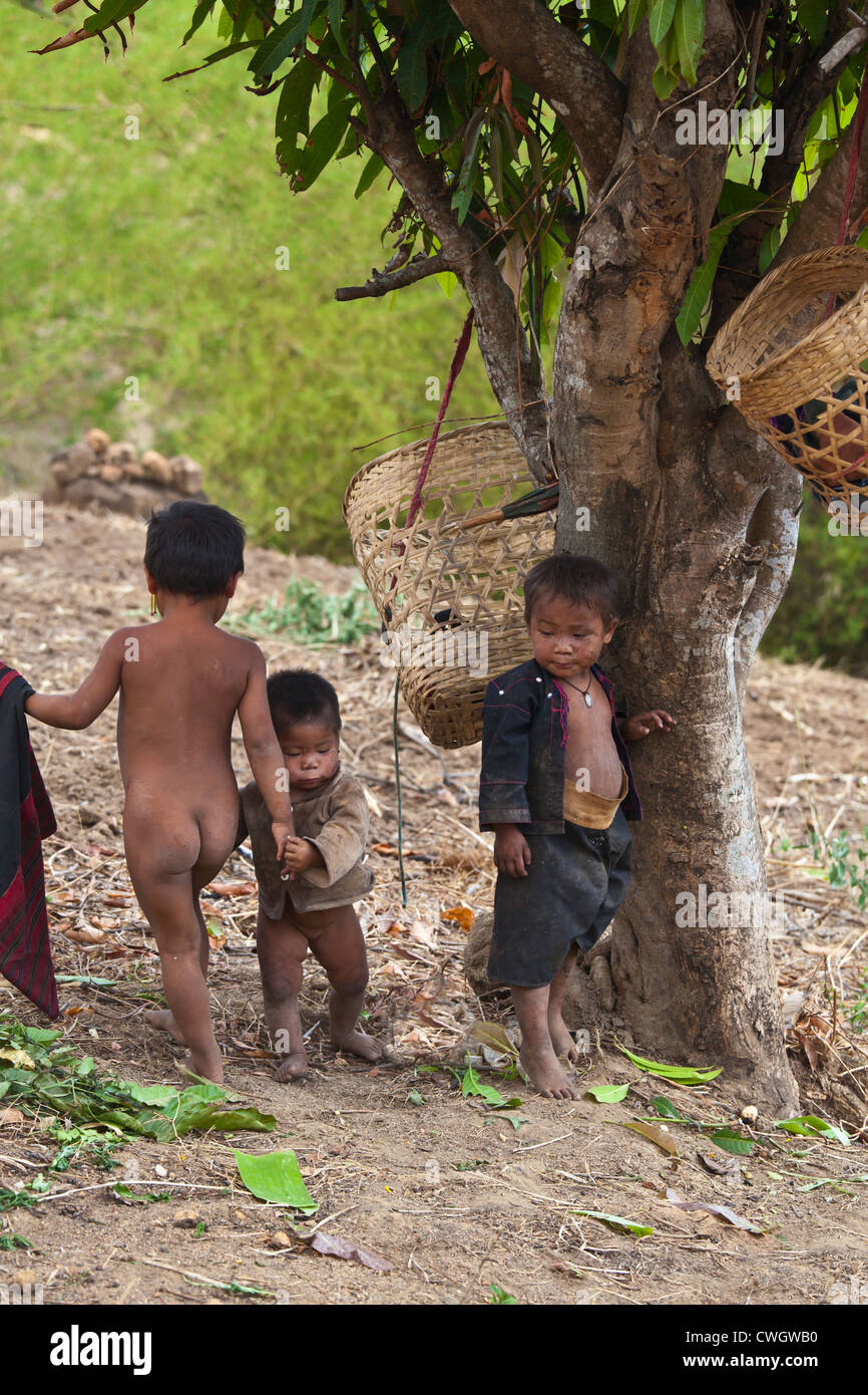 ANN children play in a agricultural field in a village near KENGTUNG or KYAINGTONG - MYANMAR Stock Photo