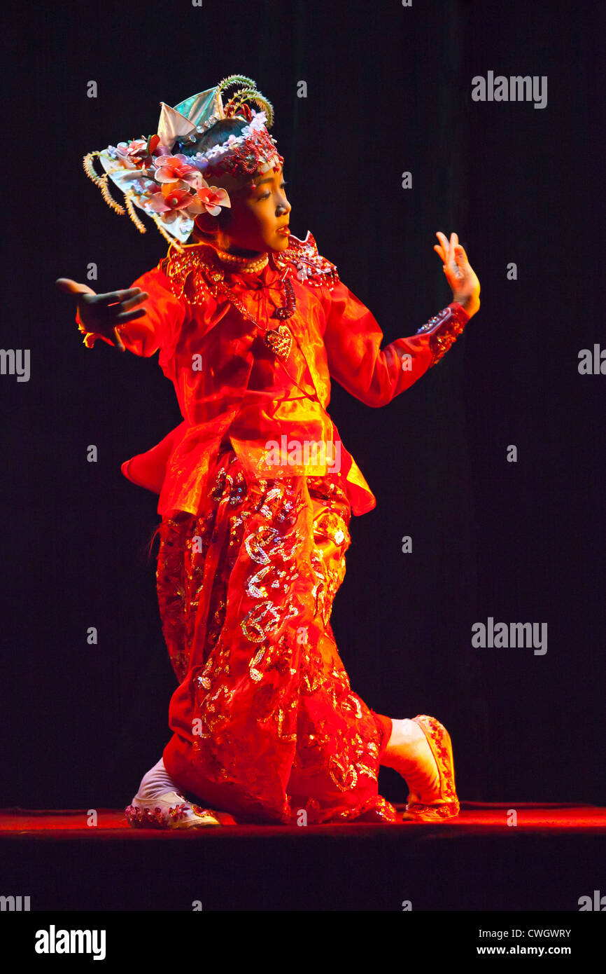 Traditional DANCE is performed at the MANDALAY MARIONETTES THEATER - MANDALAY, MYANMAR Stock Photo