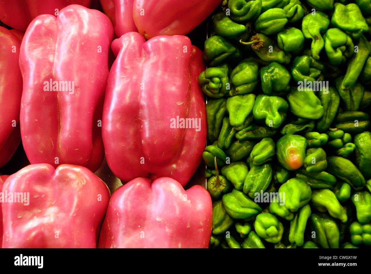red peppers green Scotch Bonnet peppers on sale in Spanish market Stock Photo - Alamy