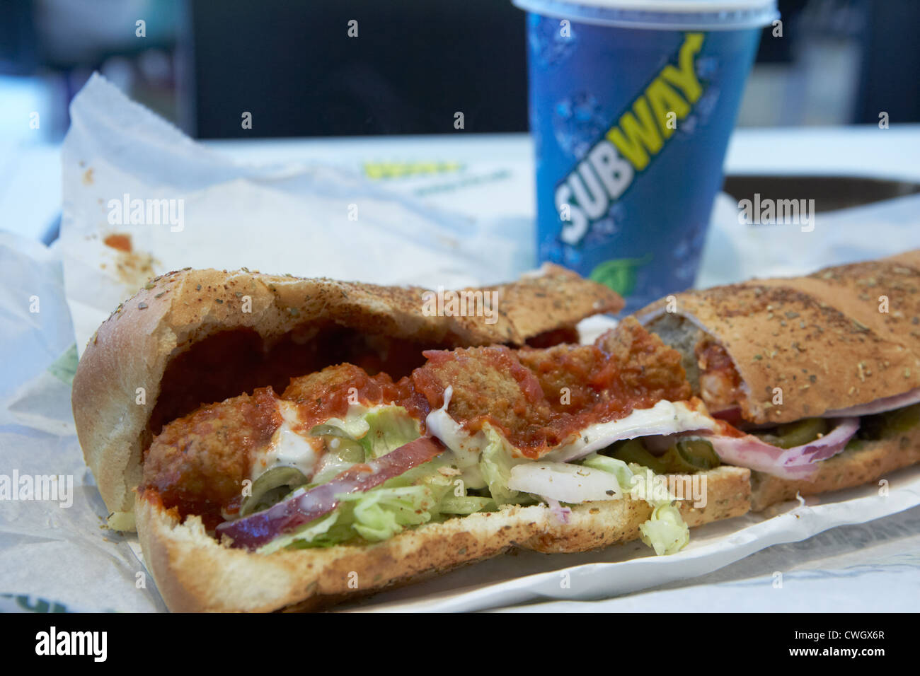 subway foot long meatball marinara sandwich with salad and dressing Stock Photo