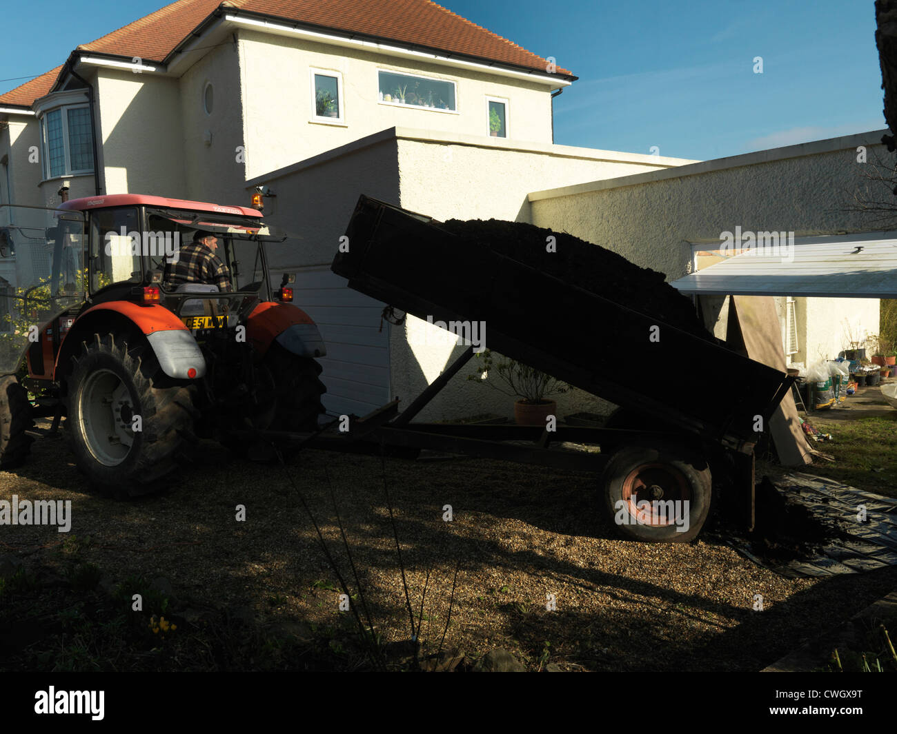 tractor Delivering horse Manure For Garden cheam Surrey England Stock Photo