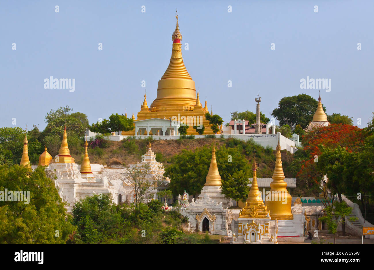 The exterior of a Buddhist Monastery is located at the base of SAGAING HILL near MANDALAY - MYANMAR Stock Photo
