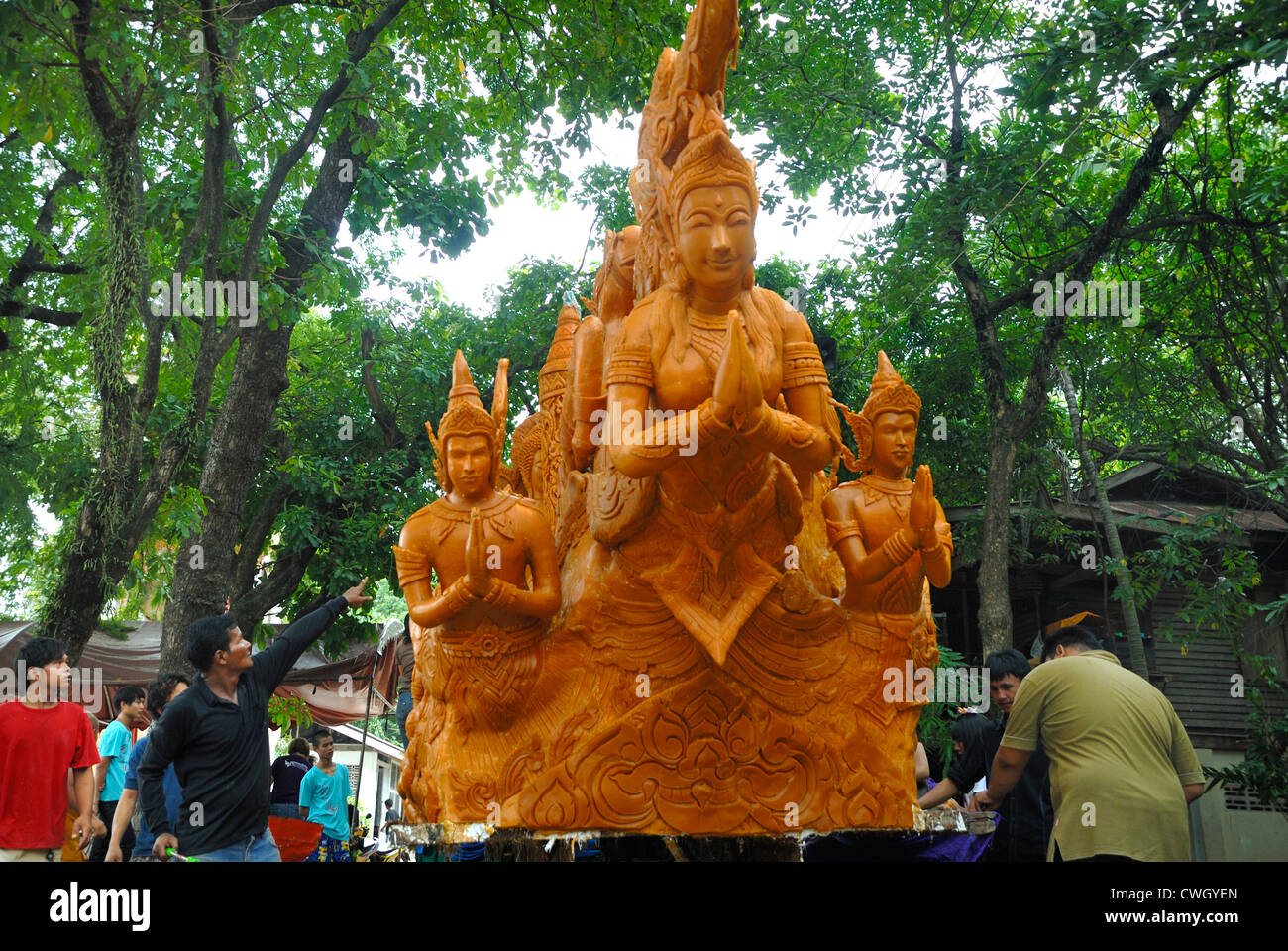 Huge carved wax figures paraded through the streets for the Candle and