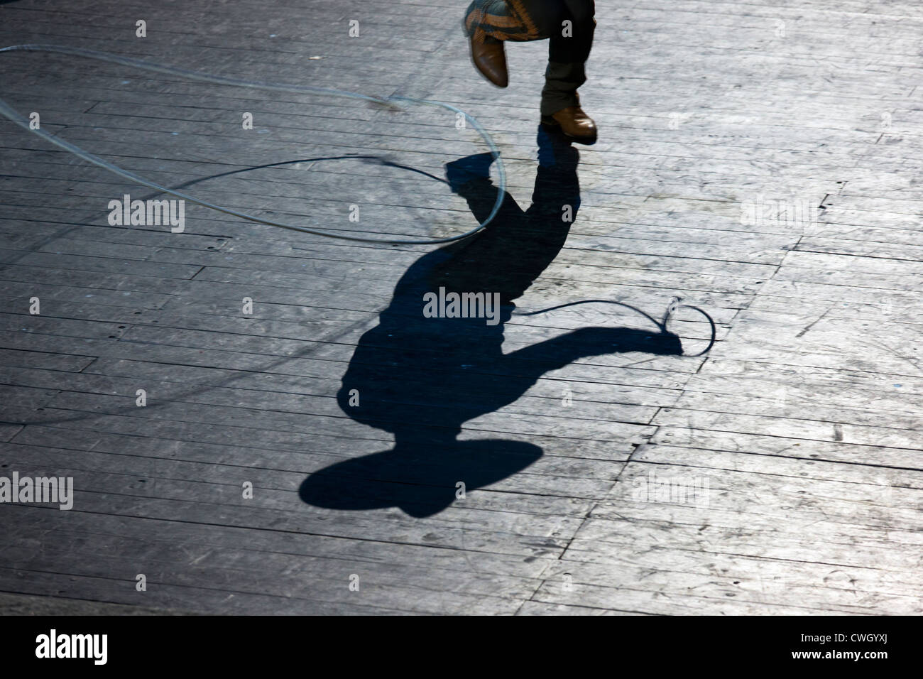 Sones de Floreo (Tricks with Rope) performed at  Xcaret , Mexico Espectacular, scene representing state of Jalisco. Stock Photo