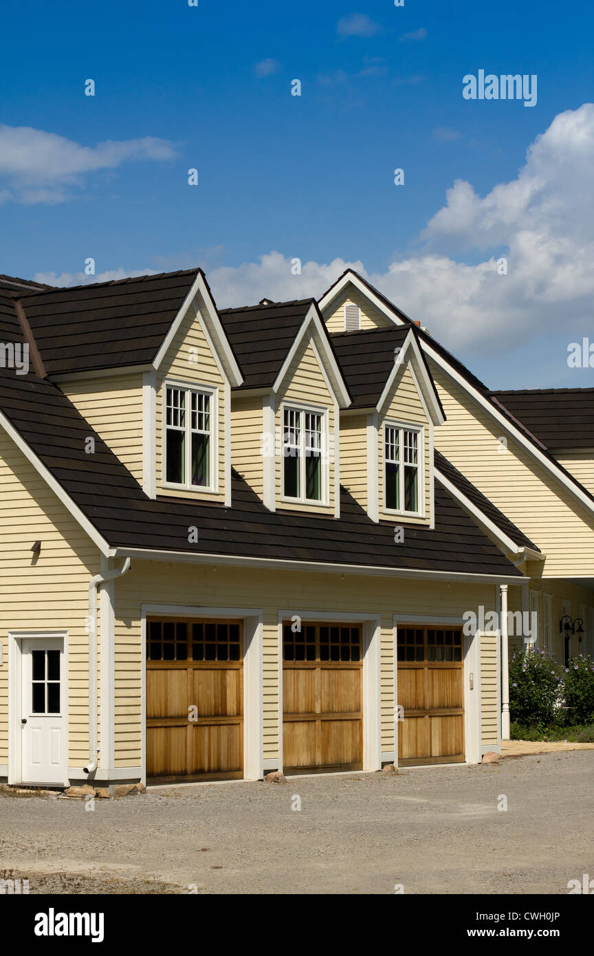 House With Three Dormers And A Triple Garage Stock Photo 50160846
