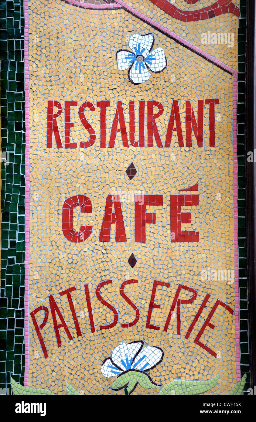 Paris, France. Cour du Commerce Sainte-Andr. Mosaic facade of Relais Odeon, Restaurant / cafe / Patisserie Stock Photo