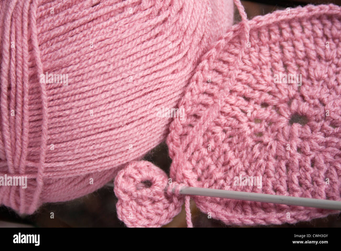 Crochet Pink yarn crochet and hook Stock Photo