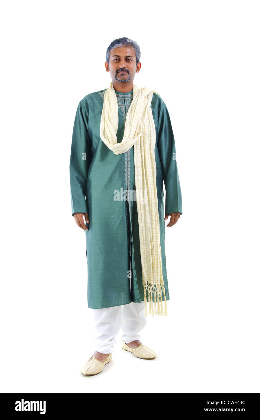 serious looking indian man in traditional dress Stock Photo