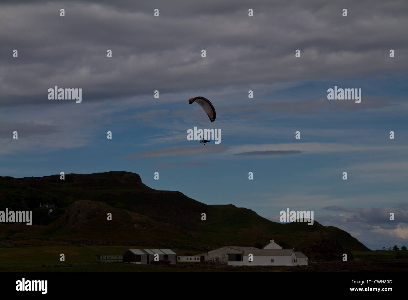 A microlite in the sky above the island of Canna, Small Isles, Scotland Stock Photo