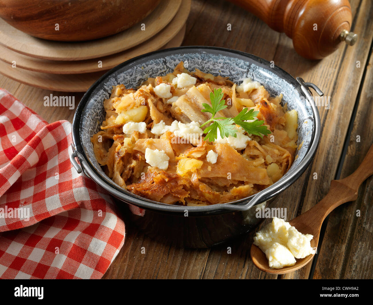 old pasta with cottage cheese in cauldron Stock Photo