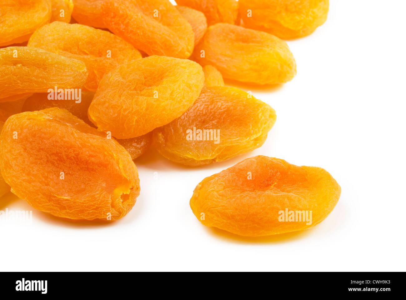 Pile of dried apricots isolated on white Stock Photo Alamy