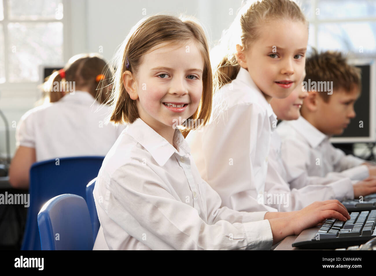 Girls in school class looking to camera Stock Photo - Alamy