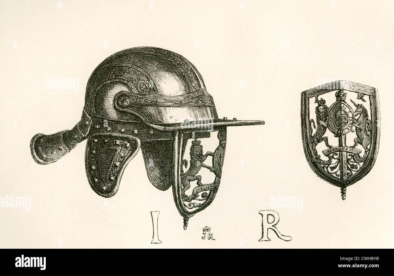 Casque of King James II with cheek pieces and perforated steel visor representing the Royal Arms. Scroll work of thistles below. Stock Photo