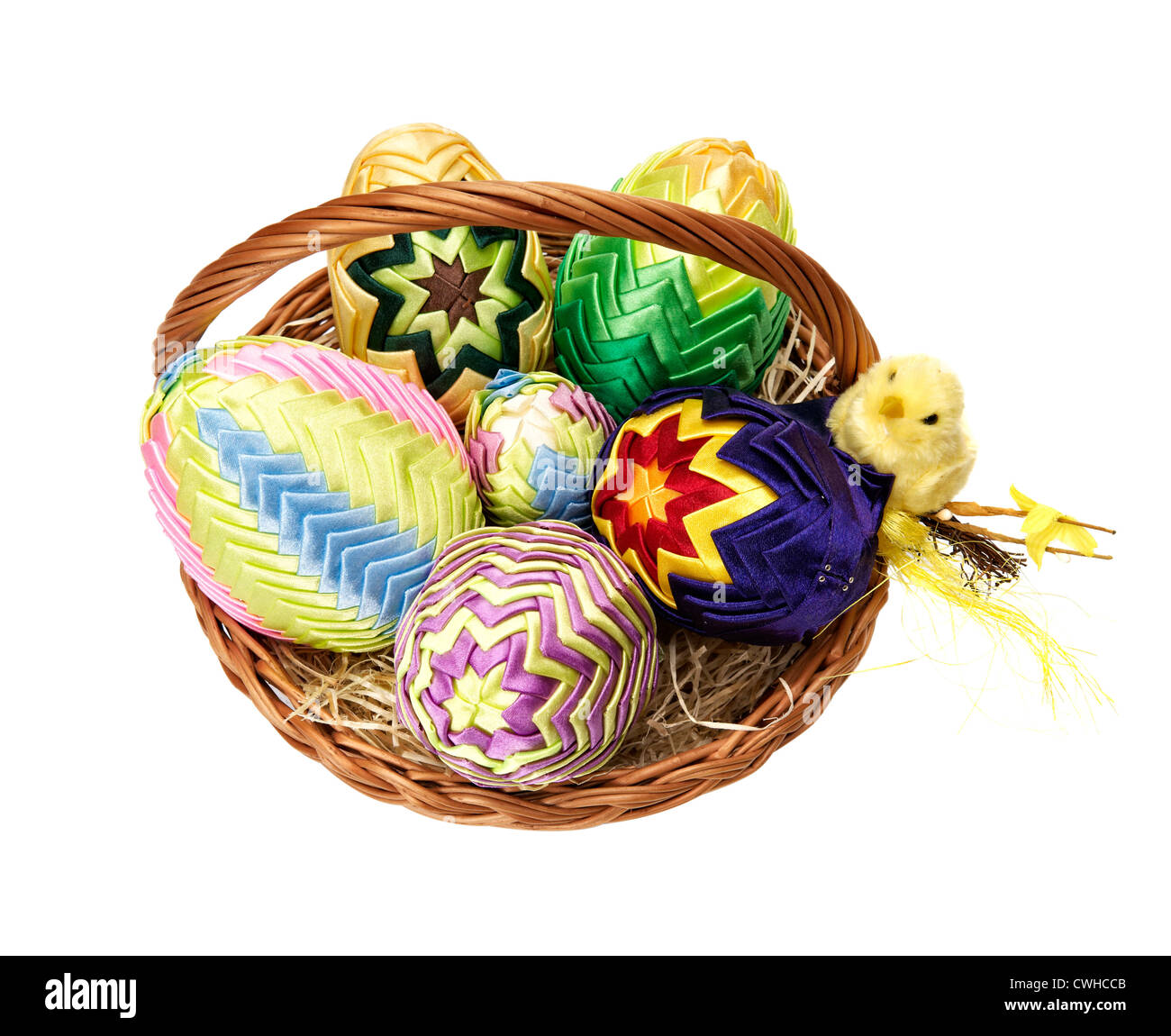 Easter eggs in wicker basket on white background Stock Photo - Alamy