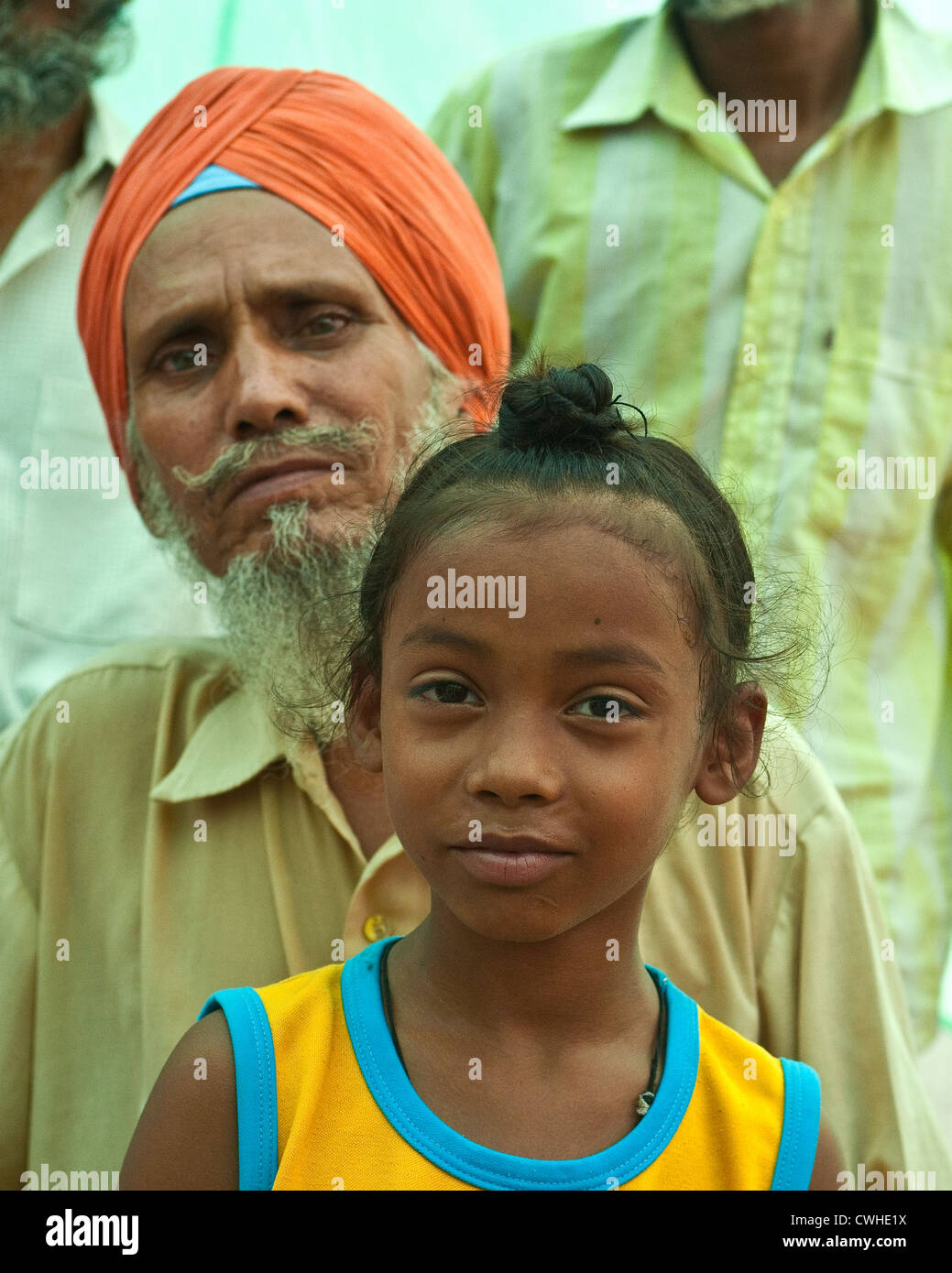 A young Sikh child with Sikh man Stock Photo