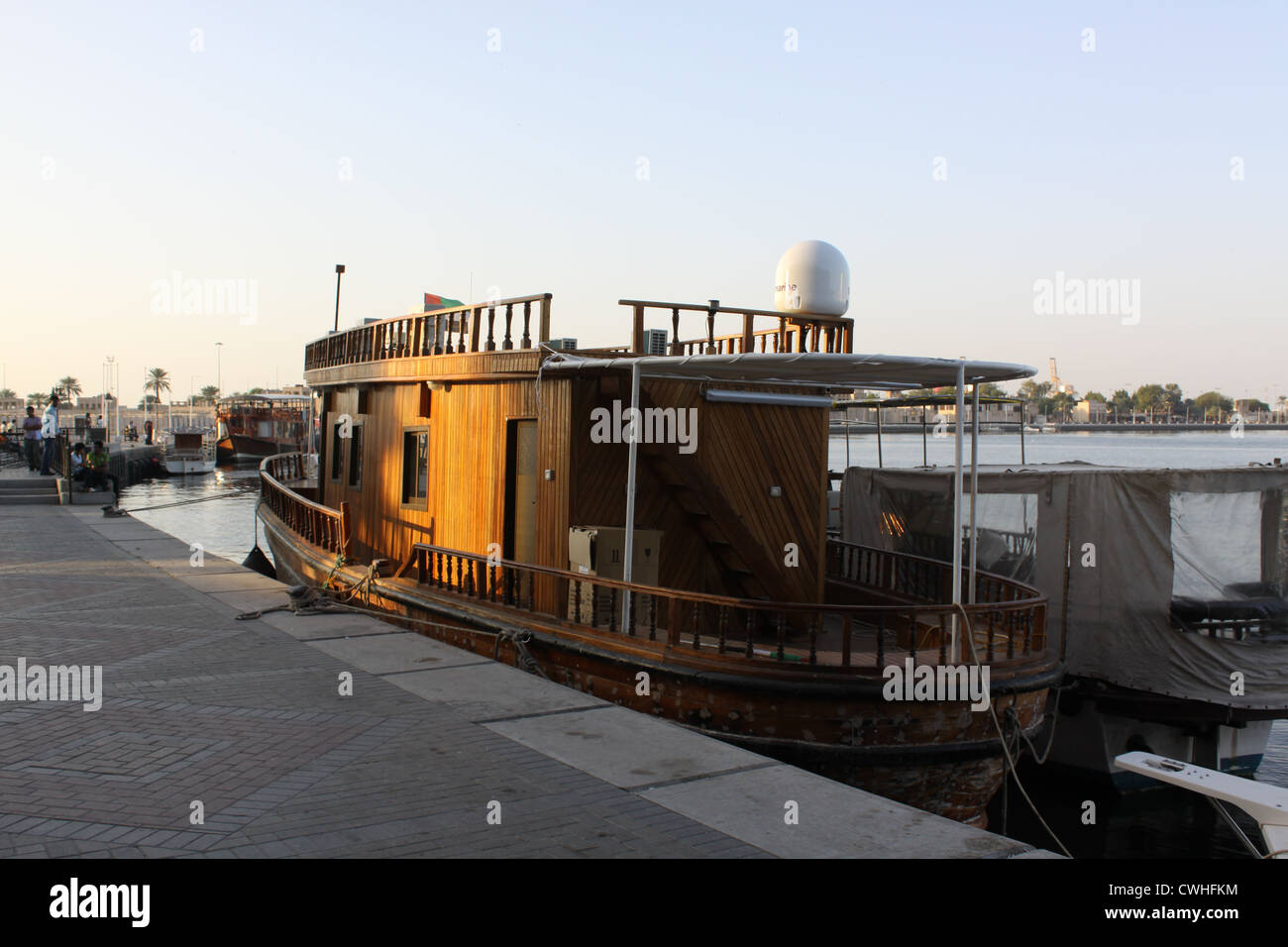 Emirates. Dubai. Recreational tourist vessel near berth in Dubai Creek Stock Photo
