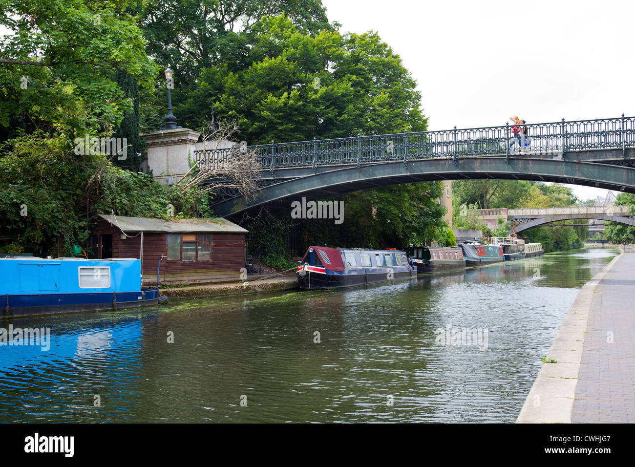 Regent Canal with Broadwalk Bridge to Regents Park - London UK Stock Photo