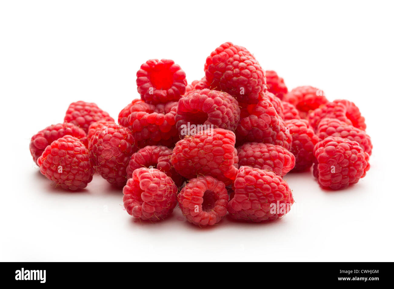 Fresh raspberry on white background Stock Photo - Alamy