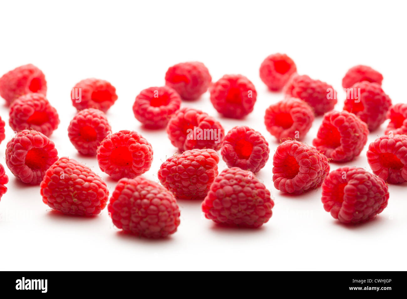 Fresh raspberry on white background Stock Photo - Alamy