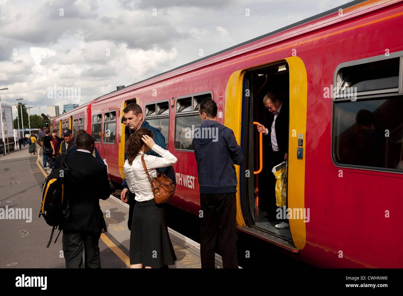 Passengers disembarking train hires stock photography and images Alamy