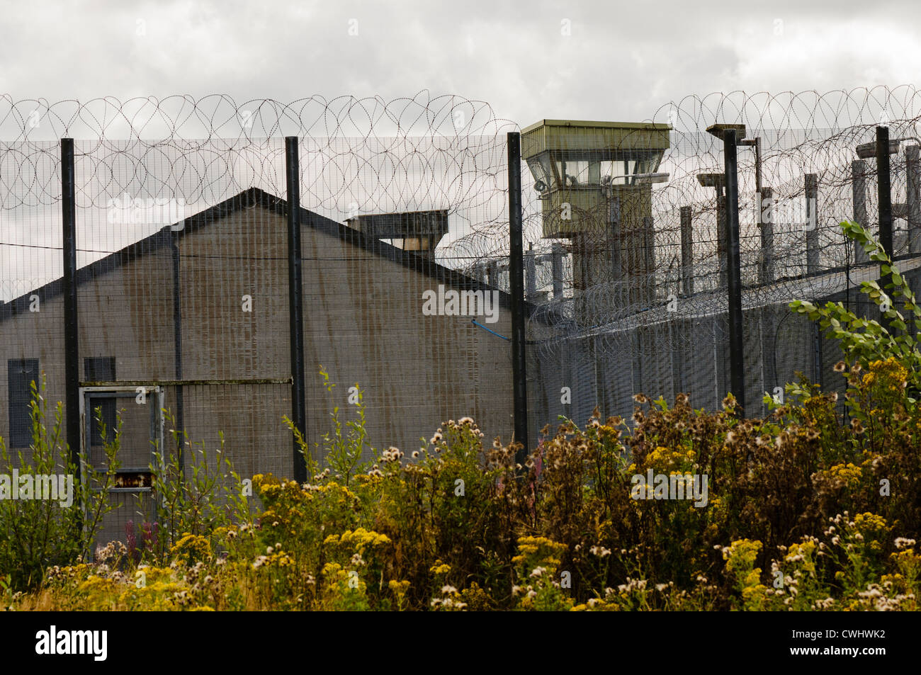 Security fences and watchtowers at the abandoned Maze Prison (Long Kesh) Stock Photo