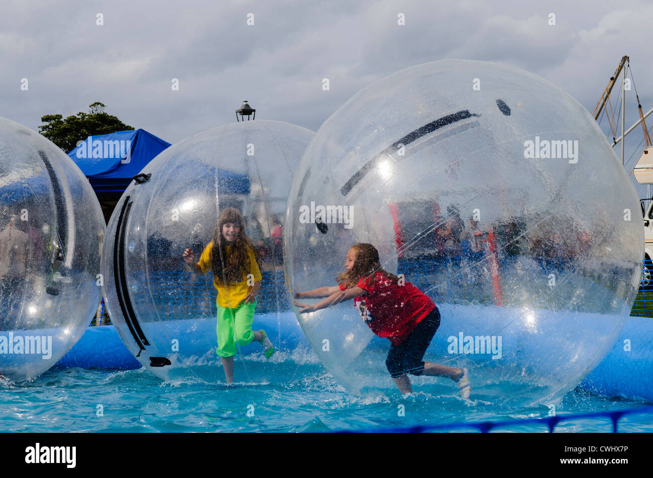 Children inside zorb balls on a pool of water Stock Photo Alamy