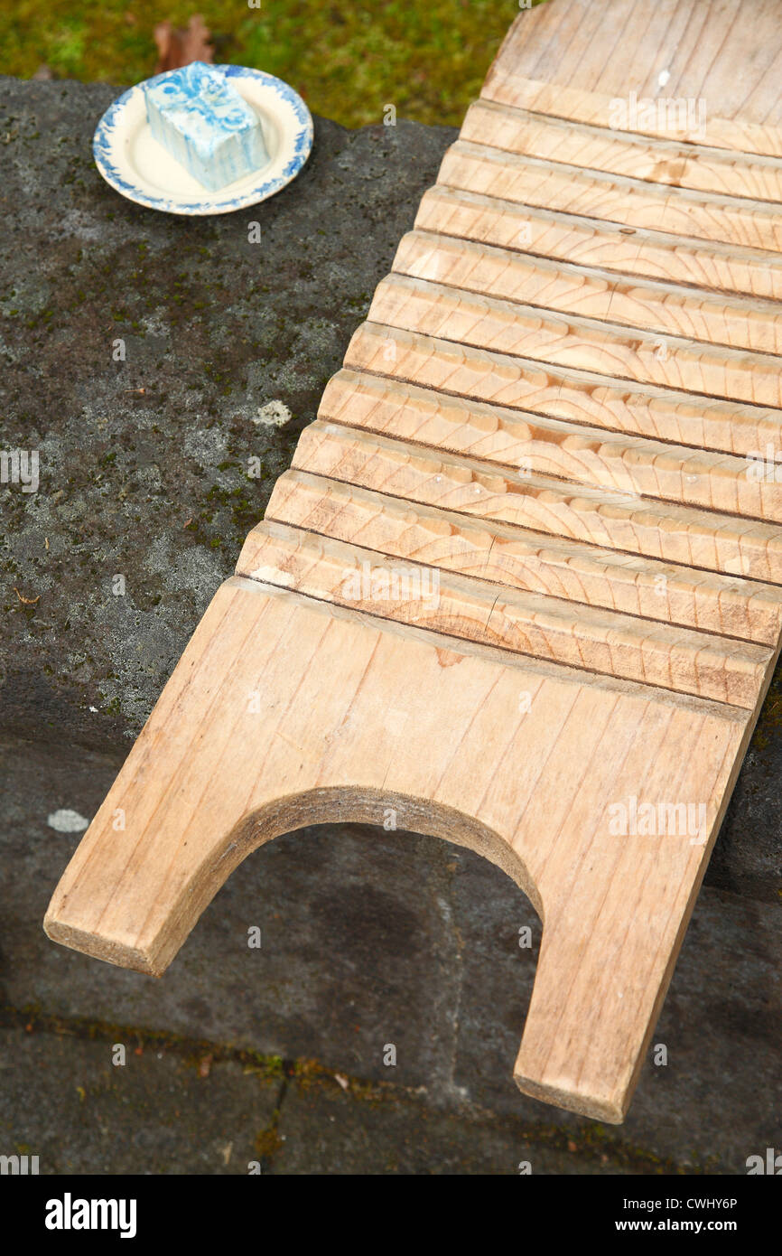 Soap and wooden washboard Stock Photo