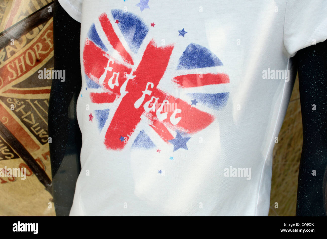 Fat Face t-shirt in a shop window, London, England Stock Photo