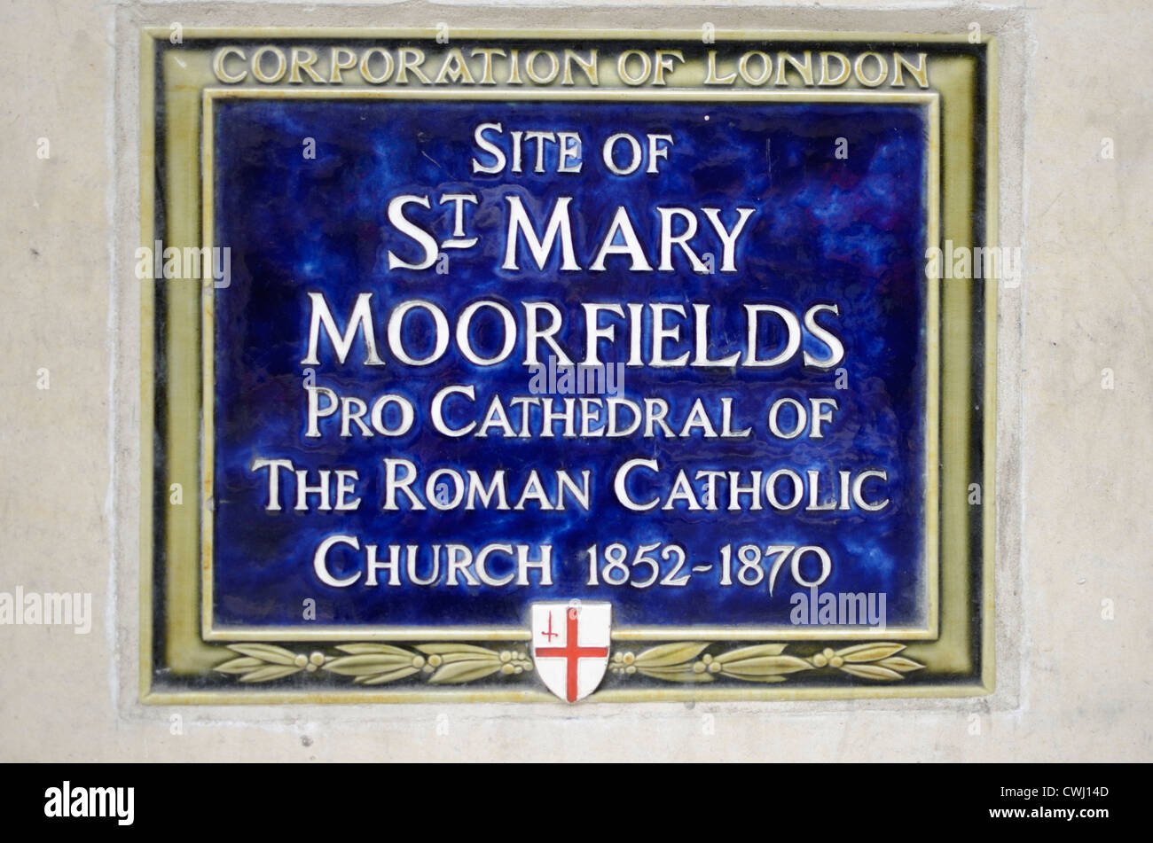 Blue plaque marking the site of St. Mary Moorfields Pro Cathedral of the Roman Catholic Church, Bloomfield St, London Stock Photo