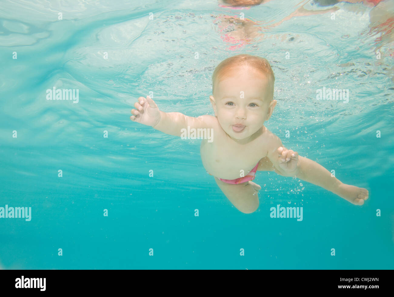 Caucasian baby swimming underwater Stock Photo Alamy