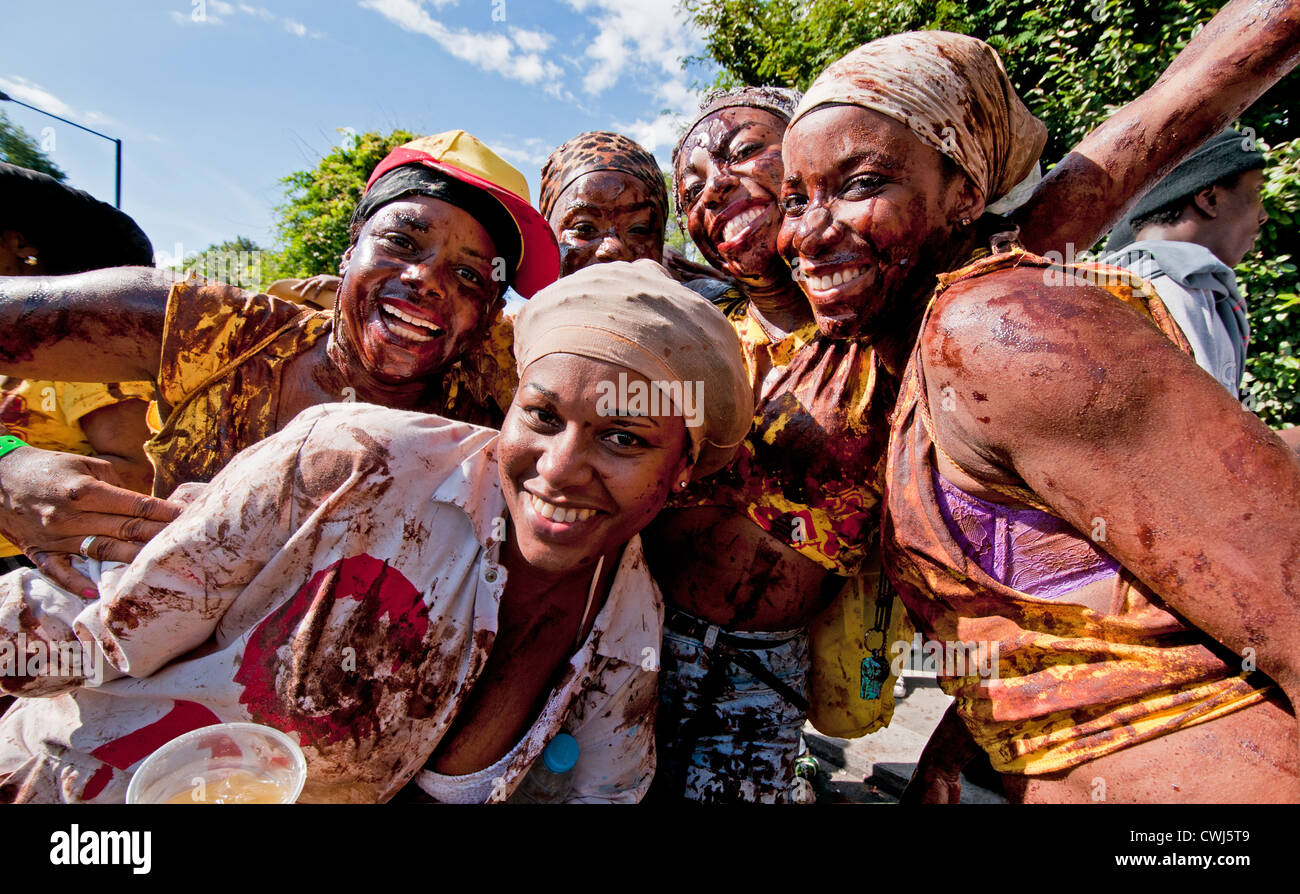Participants coated in chocolate revel at Annual Notting Hill Carnival