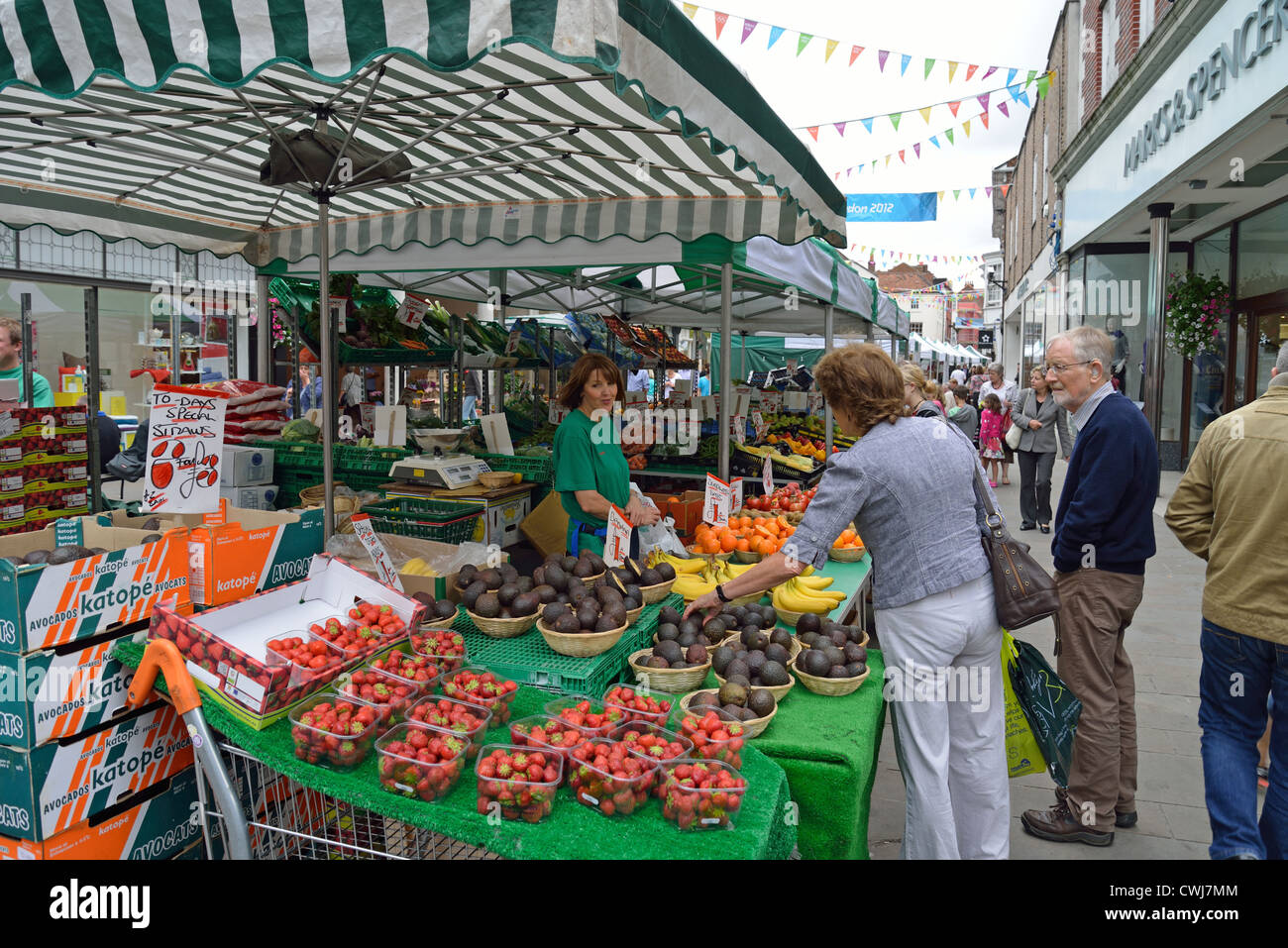 Fruit stall in street market, High Street, Winchester, Hampshire