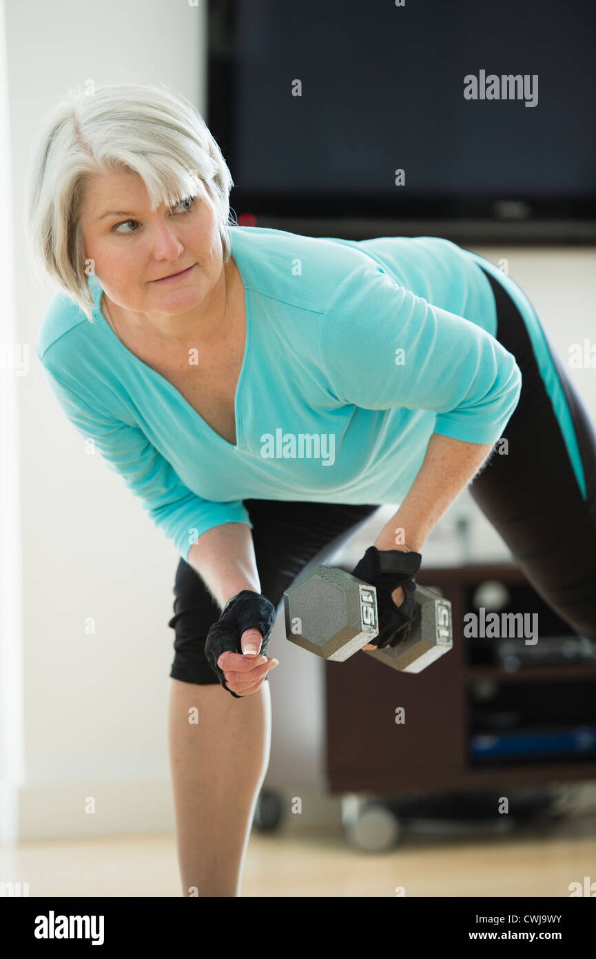 Woman bending over front hi-res stock photography and images - Alamy