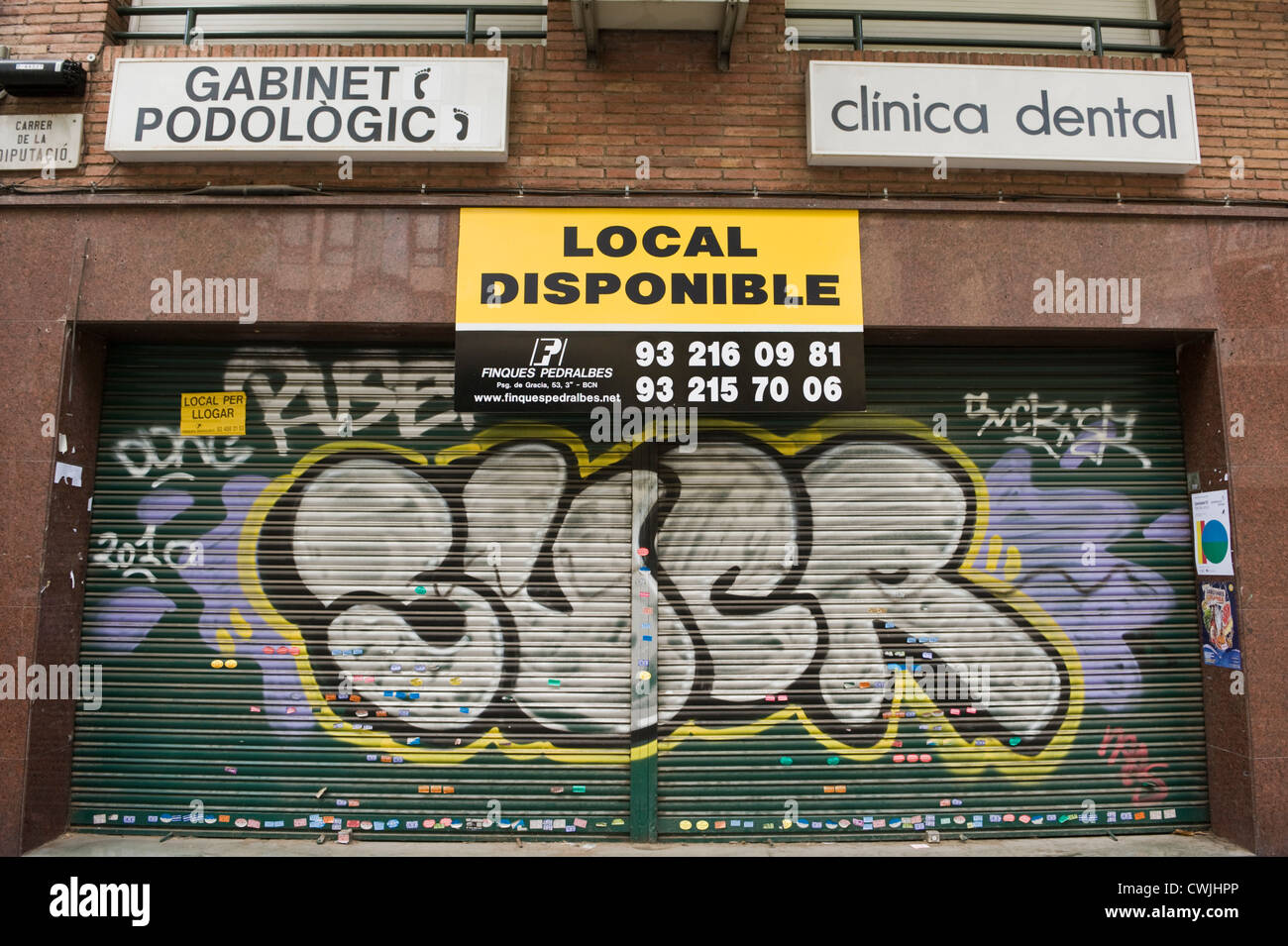 Graffiti on roller security shutter of shop in Barcelona, Catalonia, Spain,  ES Stock Photo - Alamy