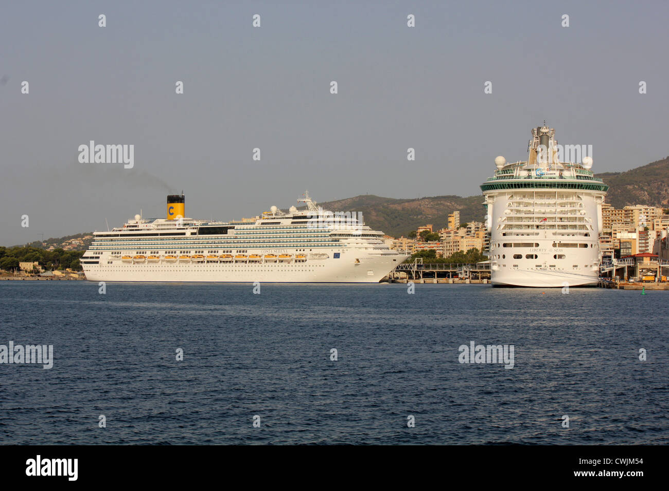 Early morning arrival of Costa Cruise Lines cruise ship 'Costa Serena' - coming onto berth in the Port of Palma de Mallorca Stock Photo