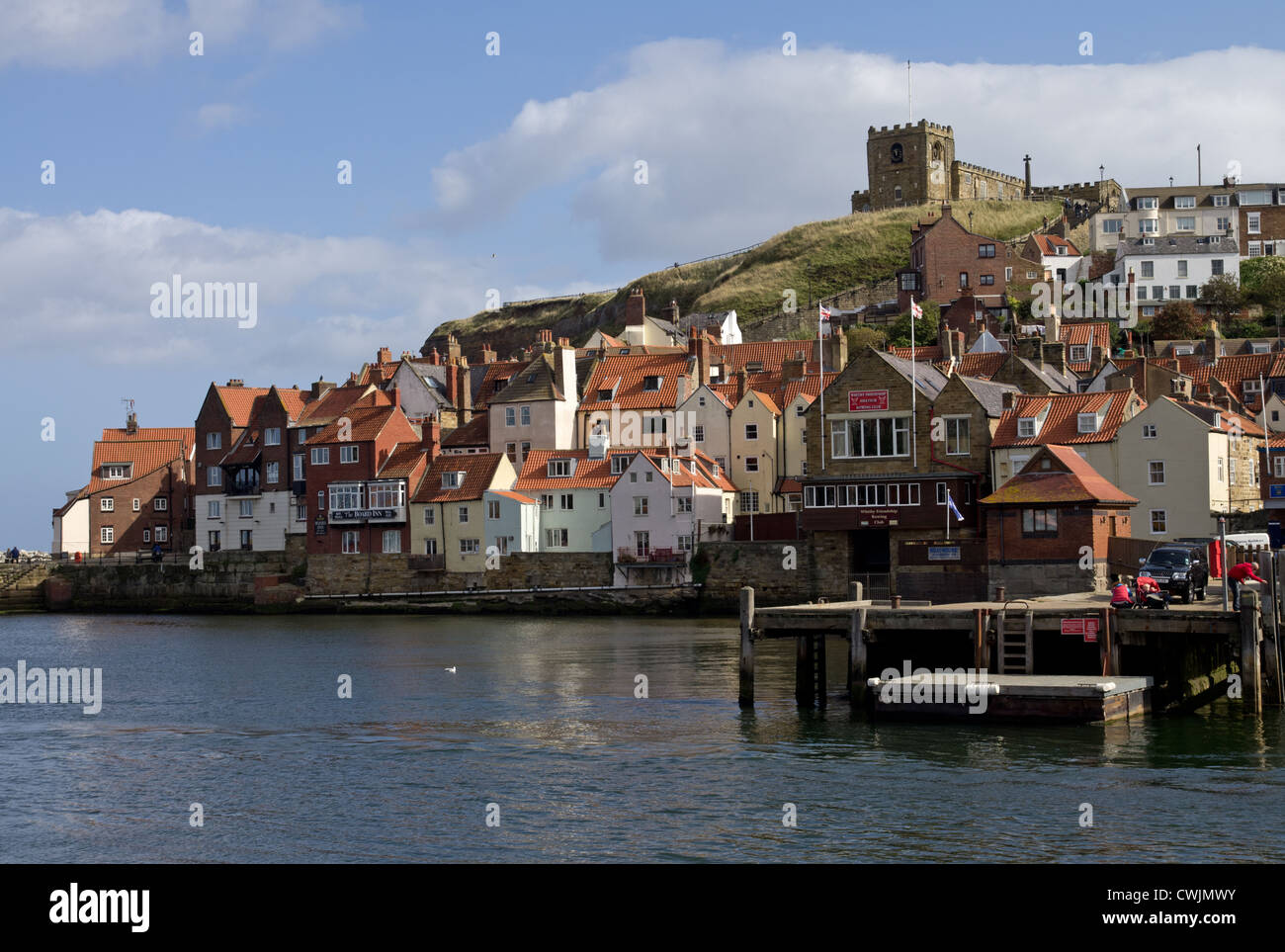 Whitby harbour and old town St Marys church Stock Photo