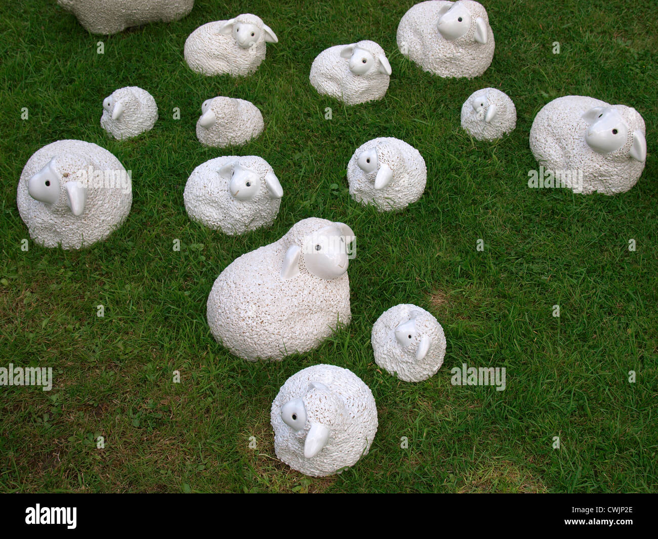 Sheep and lamb garden ornaments, UK Stock Photo Alamy