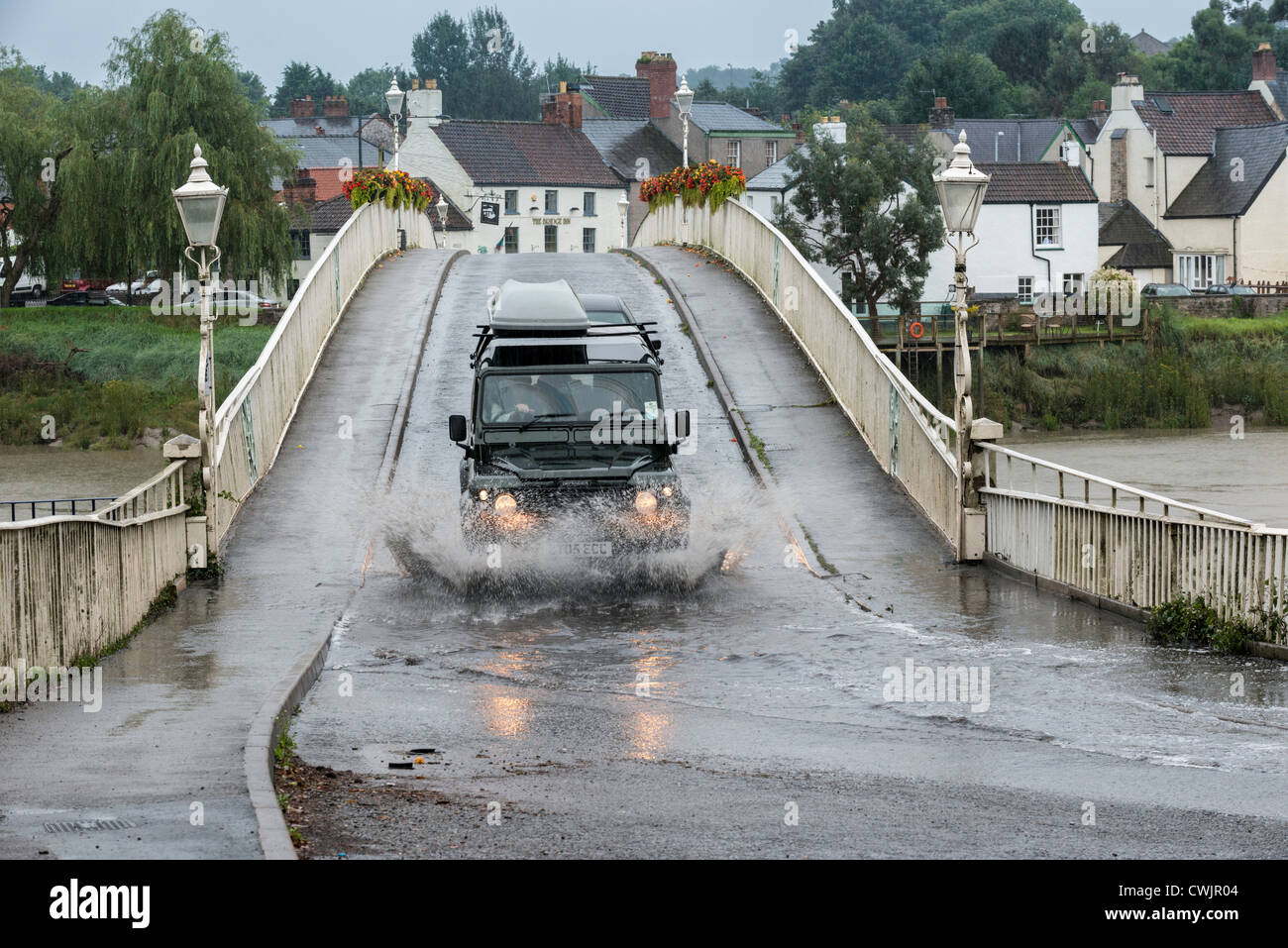 LAND ROVER IN FLOOD ON OLD WYE BRIDGE  IN SUMMER CHEPSTOW Stock Photo