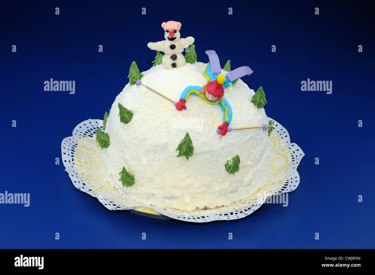 Cake - White Hill with Skier and Snowman Stock Photo