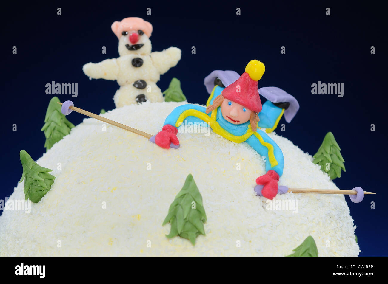 Cake - White Hill with Skier and Snowman Stock Photo
