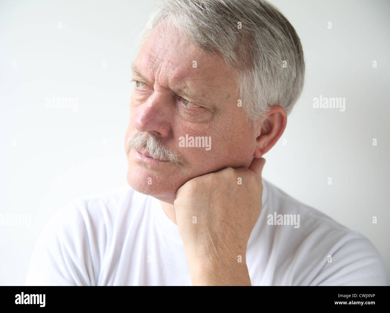 senior man with an irritated expression Stock Photo