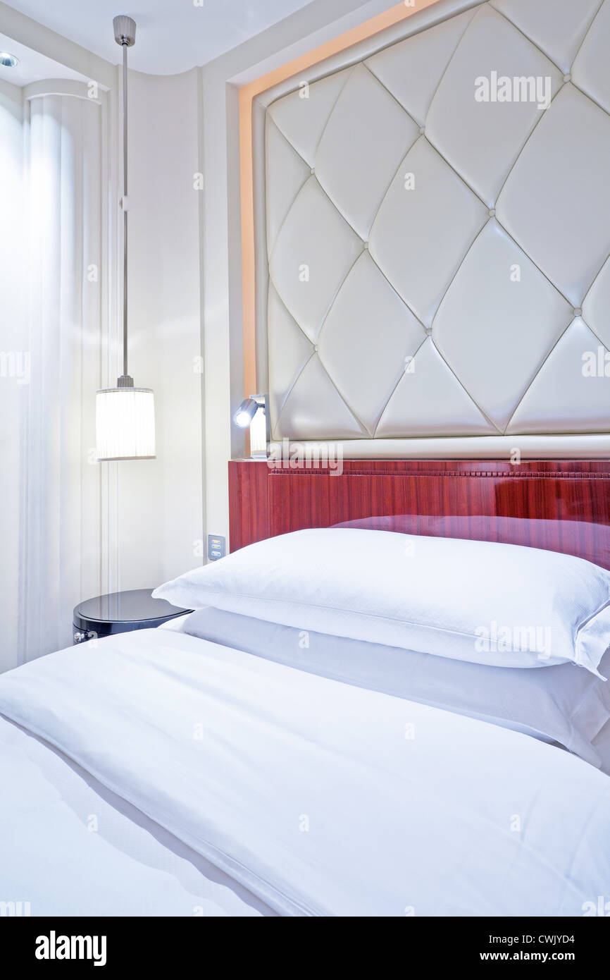 two bed in live room Stock Photo Alamy
