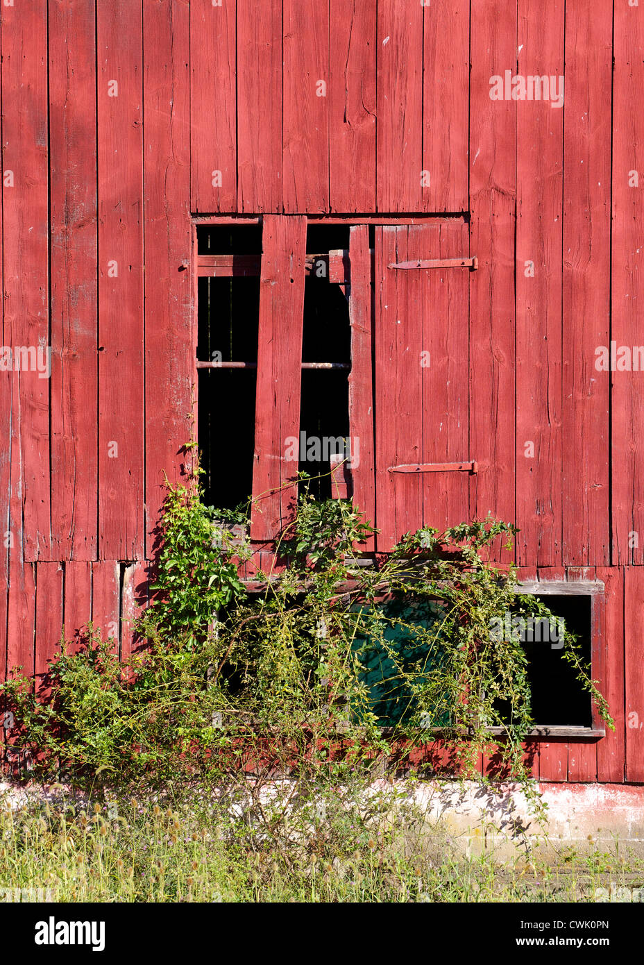 Weathered Broken Red Barn Window of New Jersey Stock Photo