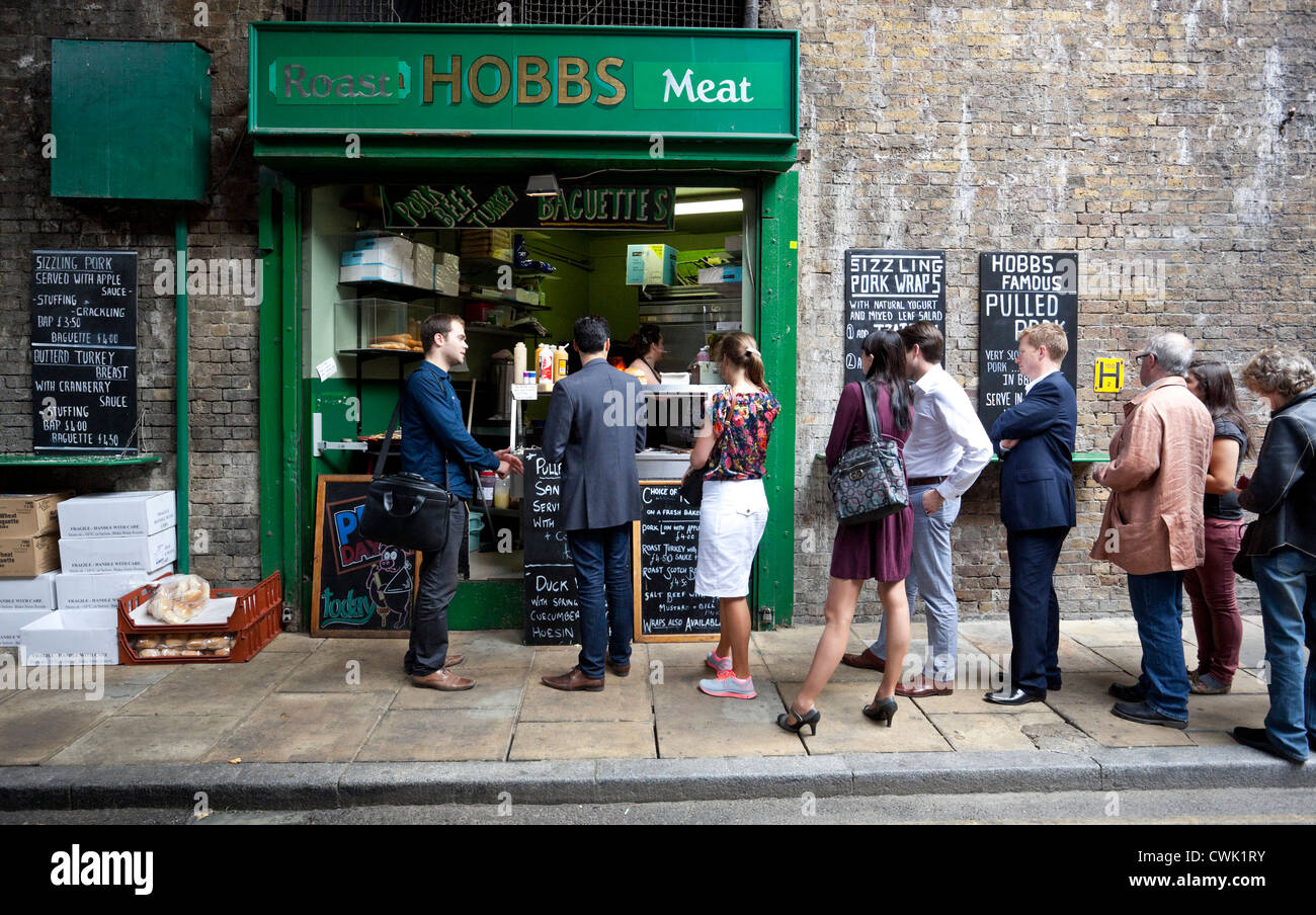 People queue at Hobbs Meat Roast, Borough Market, London, England, UK Stock Photo
