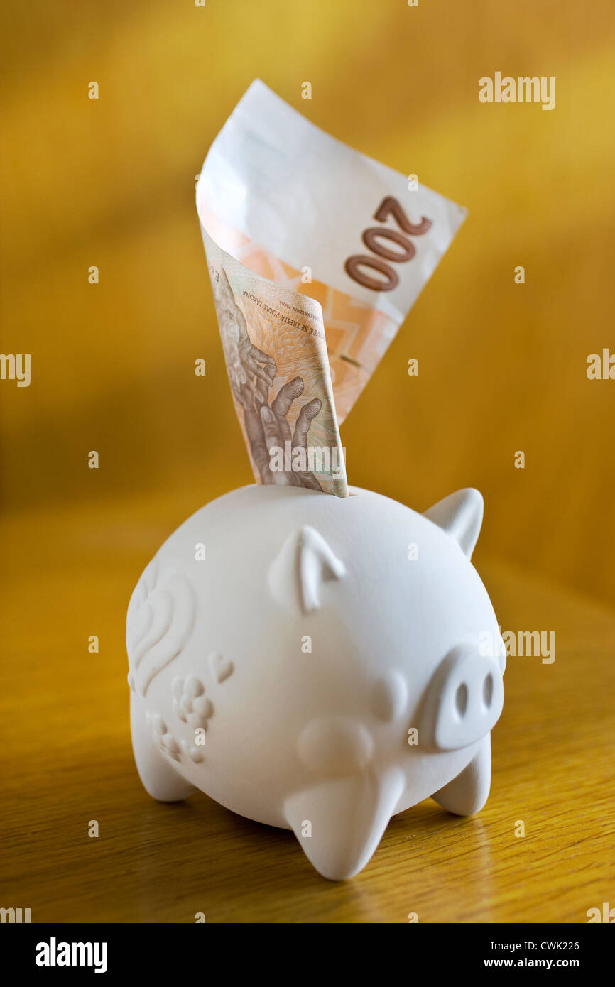Czech finance - paper money in a piggy bank Stock Photo