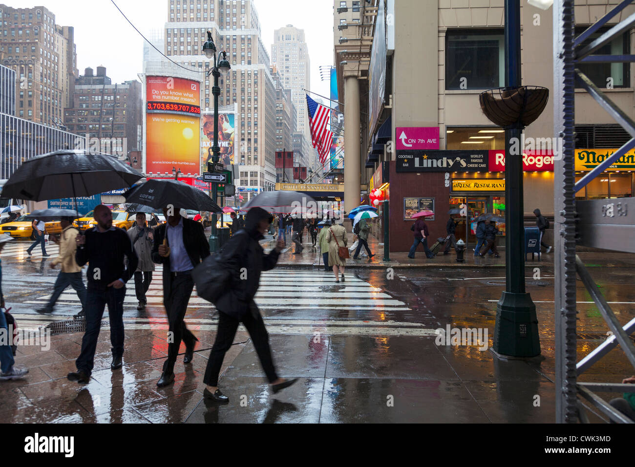 Rain raining down on 7th Avenue Manhattan, New York City, NYC, NY, USA