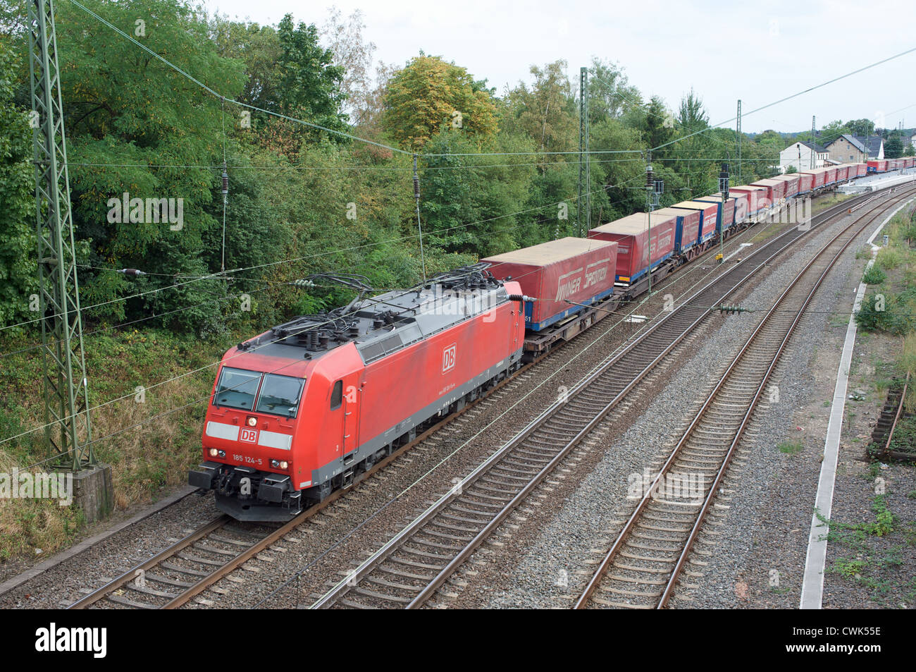 German Railways freight train loaded with Winner Spedition trucks