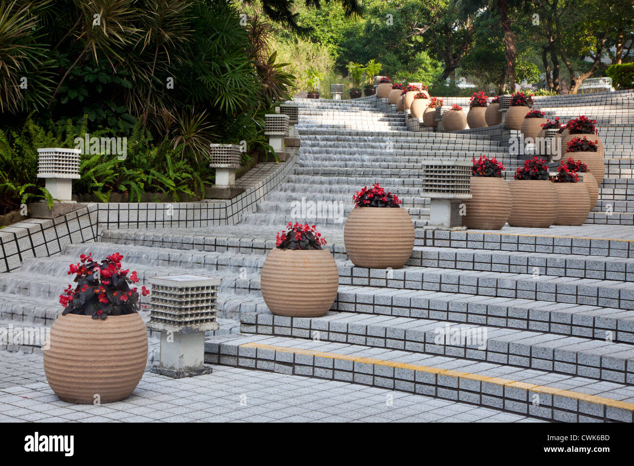 Asia, China, Hong Kong. Steps and floral pots in Hong Kong Park Stock