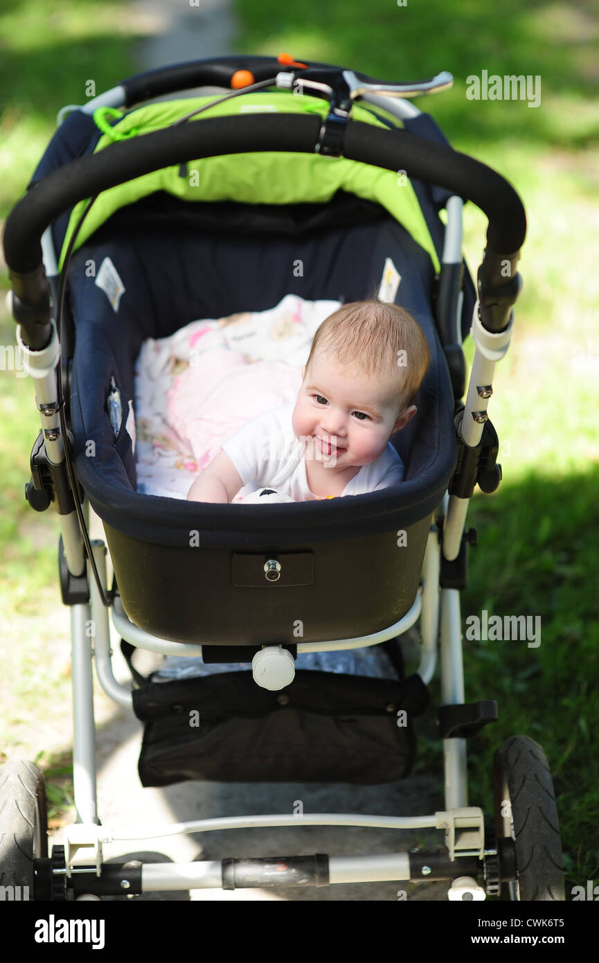 Baby in babycoach Stock Photo Alamy